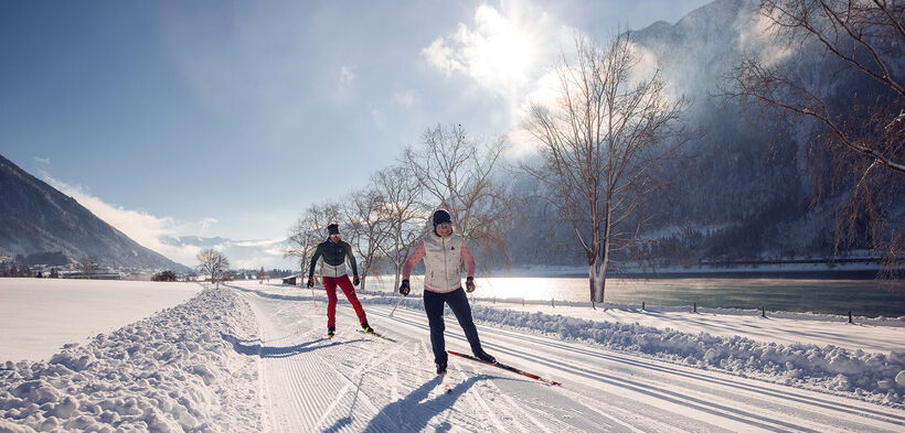 Cross-country ski over 220 kilometres of expertly groomed trails at Lake Achensee, Tirol's largest lake.