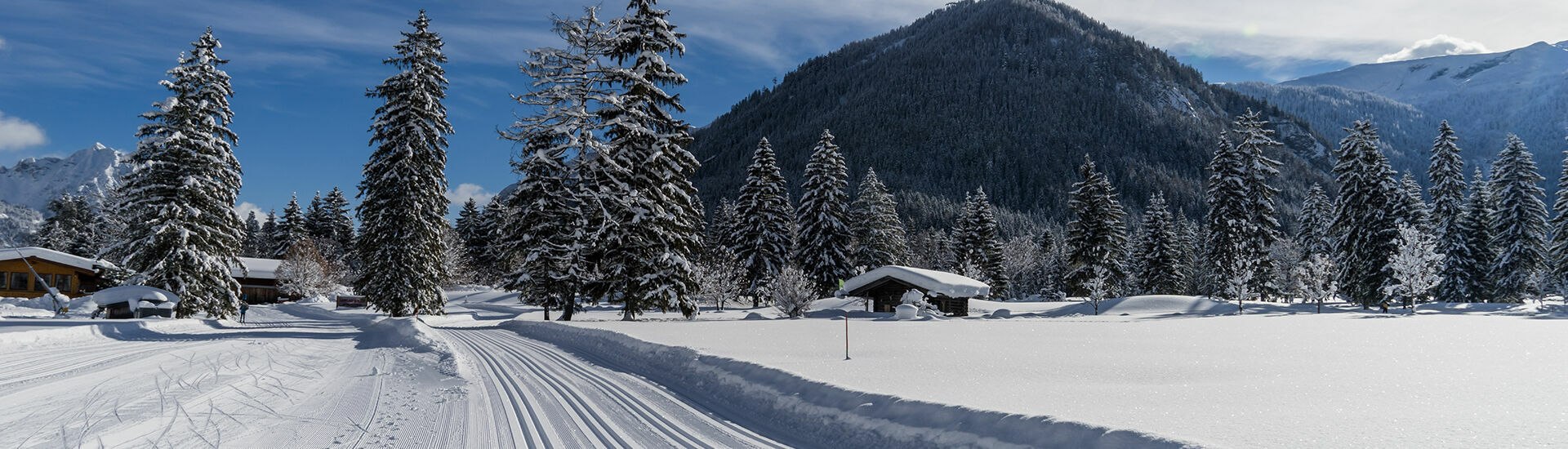 Cross-country ski trail in the Karwendel valleys in Pertisau am Achensee The Achensee region is one of the most popular cross-country skiing destinations in Tirol, boasting over 210 kilometres of groomed trails.}