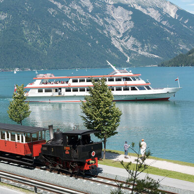 The launch of the Achenseeschifffahrt and the steam cog railway marked the beginning of tourism at Lake Achensee.