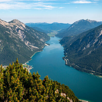 The Bärenkopf in the Nature Park Karwendel affords spectacular views of Lake Achensee and its surrounding villages. 